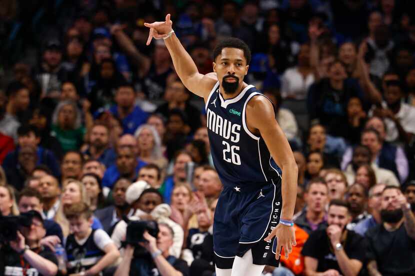 Dallas Mavericks guard Spencer Dinwiddie (26) celebrates after making a three-point shot...