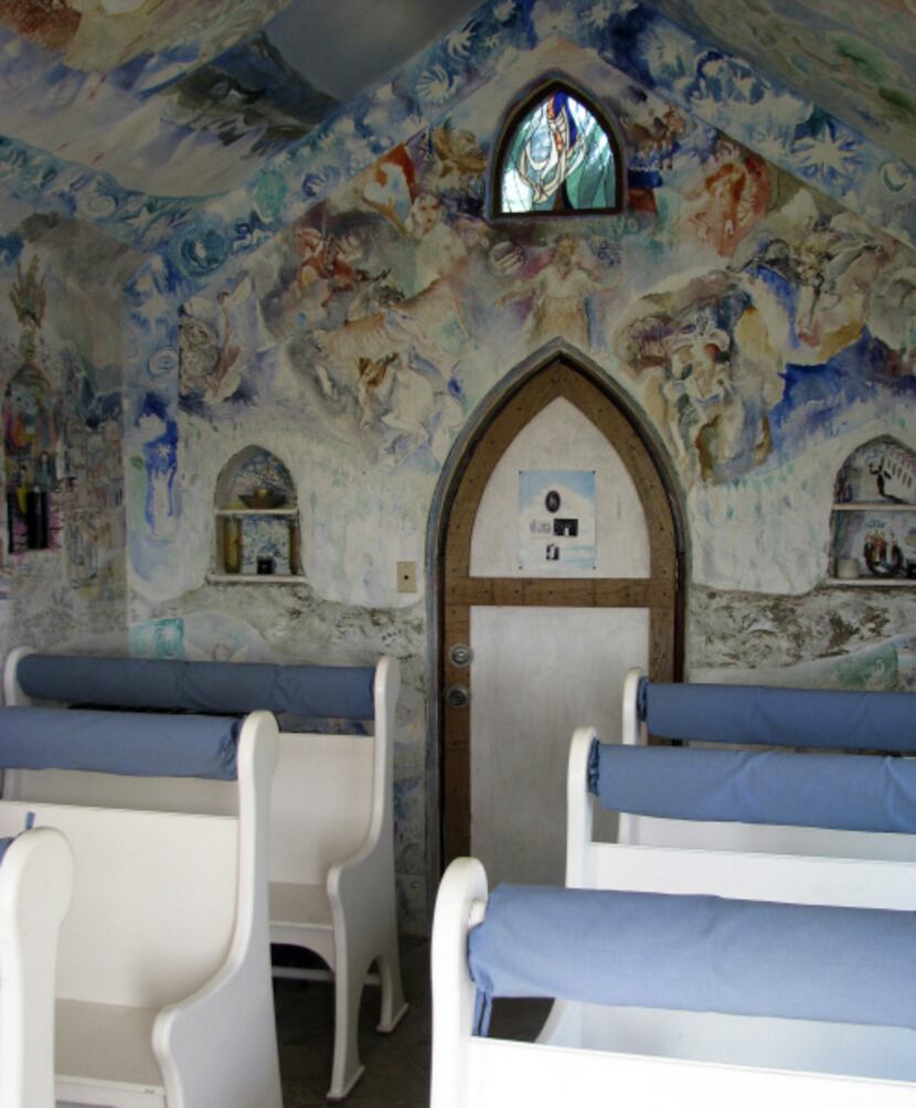 The chapel's interior murals were painted as a gift by Austin artist John Cobb in the 1970s,