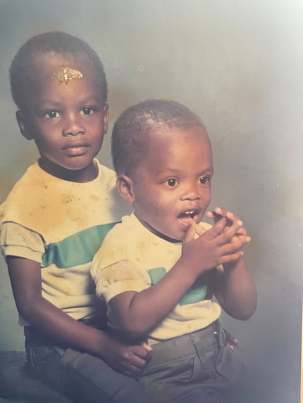 Harold (left) with his brother, Brian Dillard (right), as children. Brian was killed in...