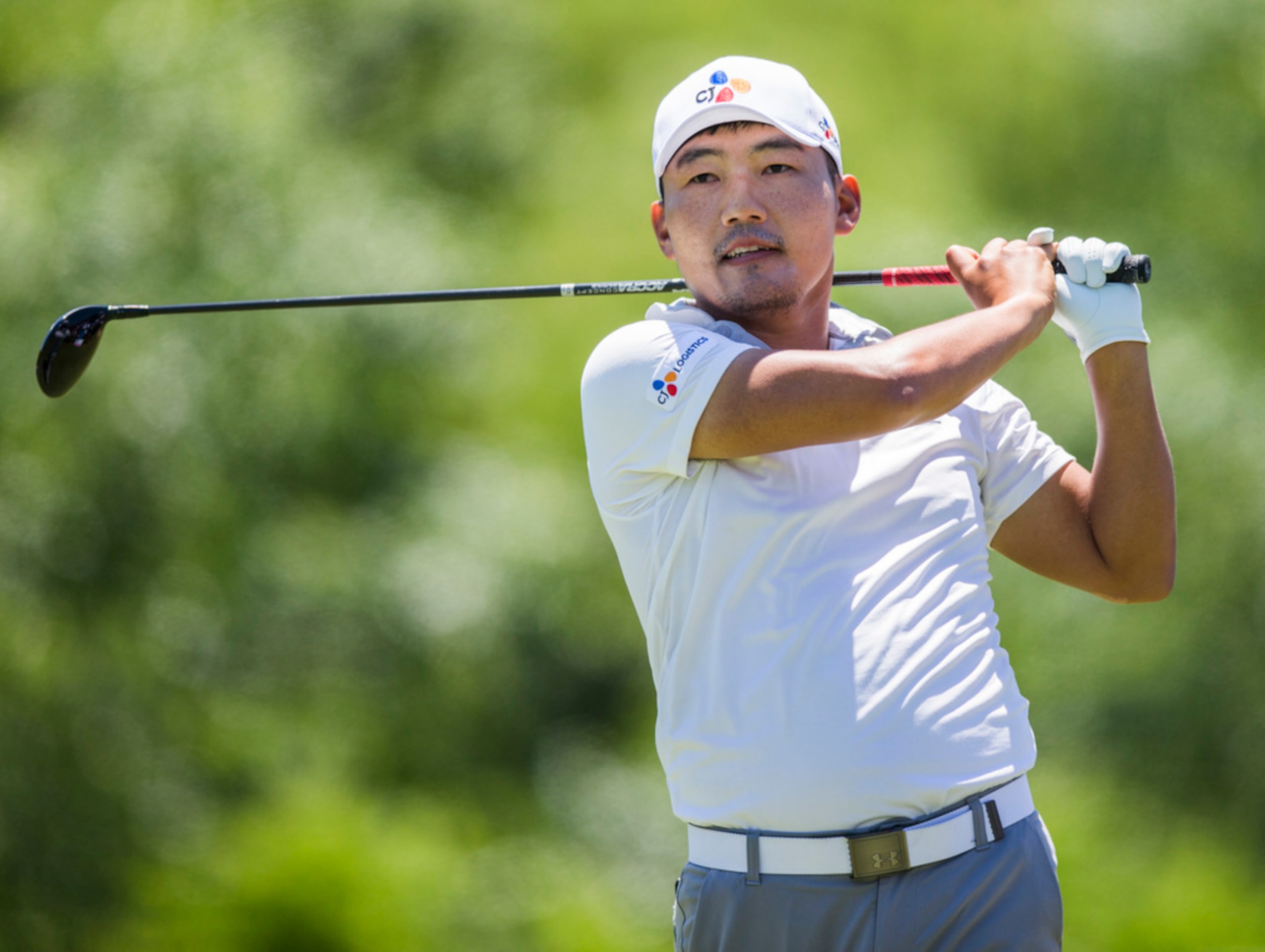 Sung Kang tees off at hole 4 during round 4 of the AT&T Byron Nelson golf tournament on...