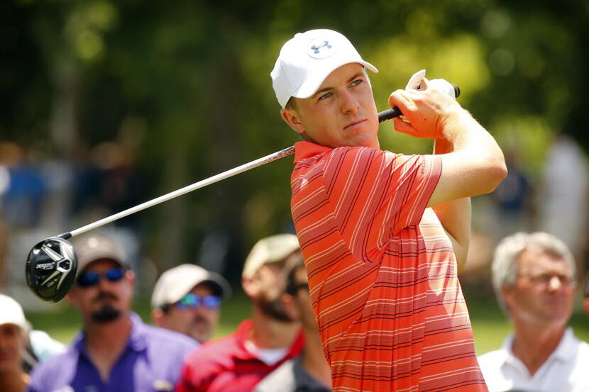 Golfer Jordan Spieth drives his ball off the No. 11 tee during the second round of the Dean...
