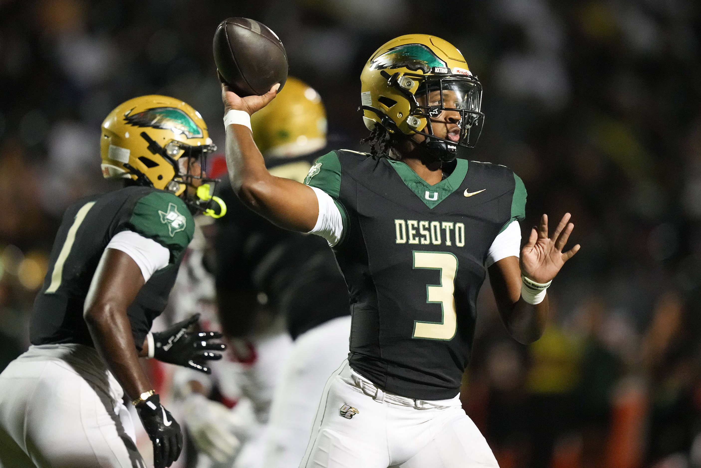 DeSoto quarterback Kelden Ryan (3) throws a pass during the first half of a District 11-6A...