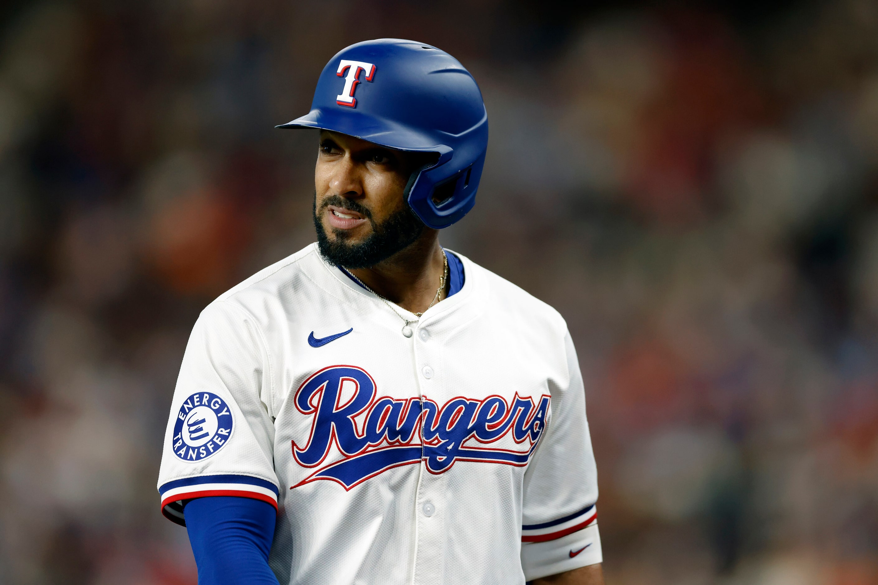 Texas Rangers second baseman Marcus Semien (2) walks to the dugout after an at bat during...