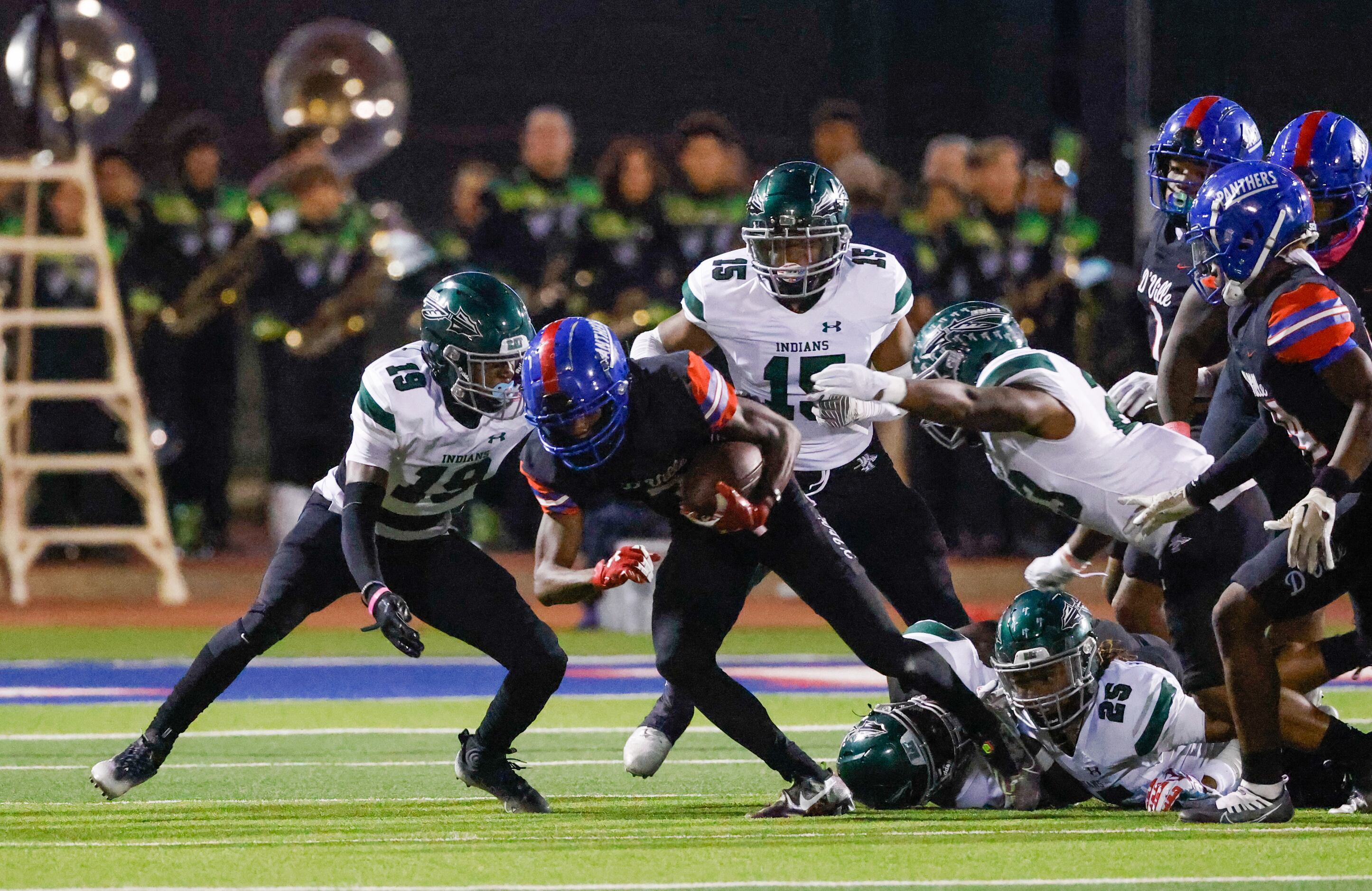 Duncanville wide receiver Davion Blunt (3) is tackled by Waxahachie defense in the first...