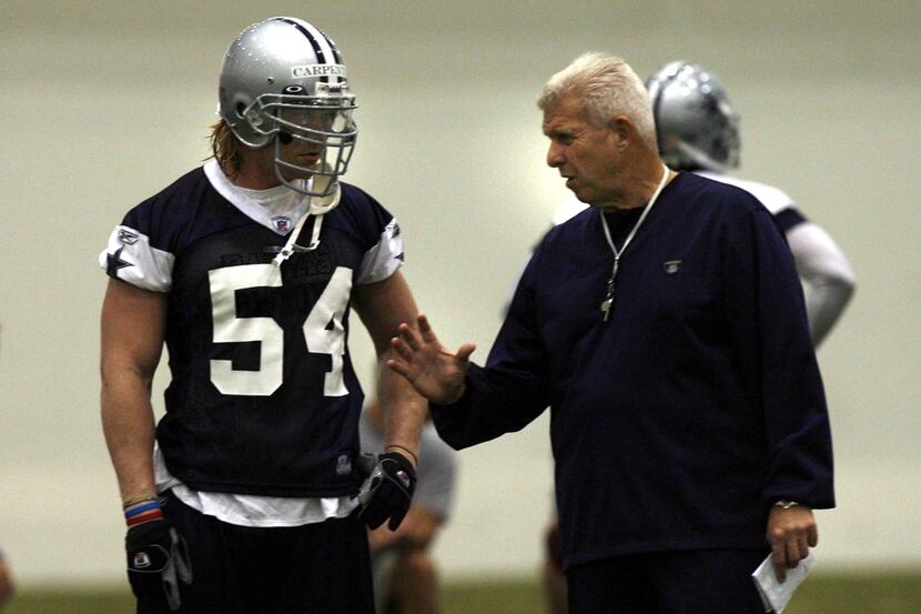 Dallas Cowboys coach Bill Parcells (right) counsels first-round draft choice Bobby Carpenter...