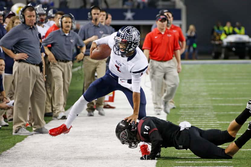 Allen quarterback Kyler Murray (1)  is forced out of bounds by Pearland defensive back Caleb...
