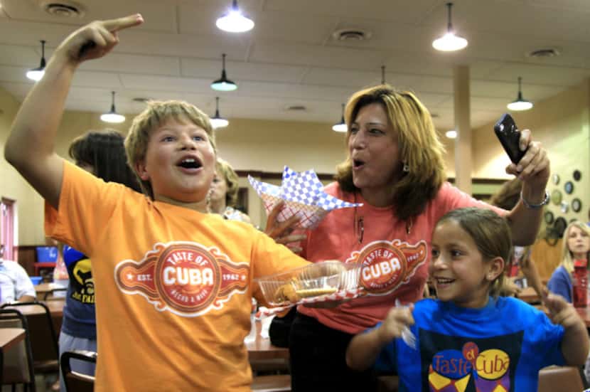 Joseph Rousso, 6, (left) son of Isaac Rousso; Sara Rousso (center), Isaac's sister; and Sara...