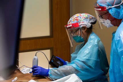 From left, Dr. Catherine Chen and certified registered nurse anesthetist Brian Farrell team...