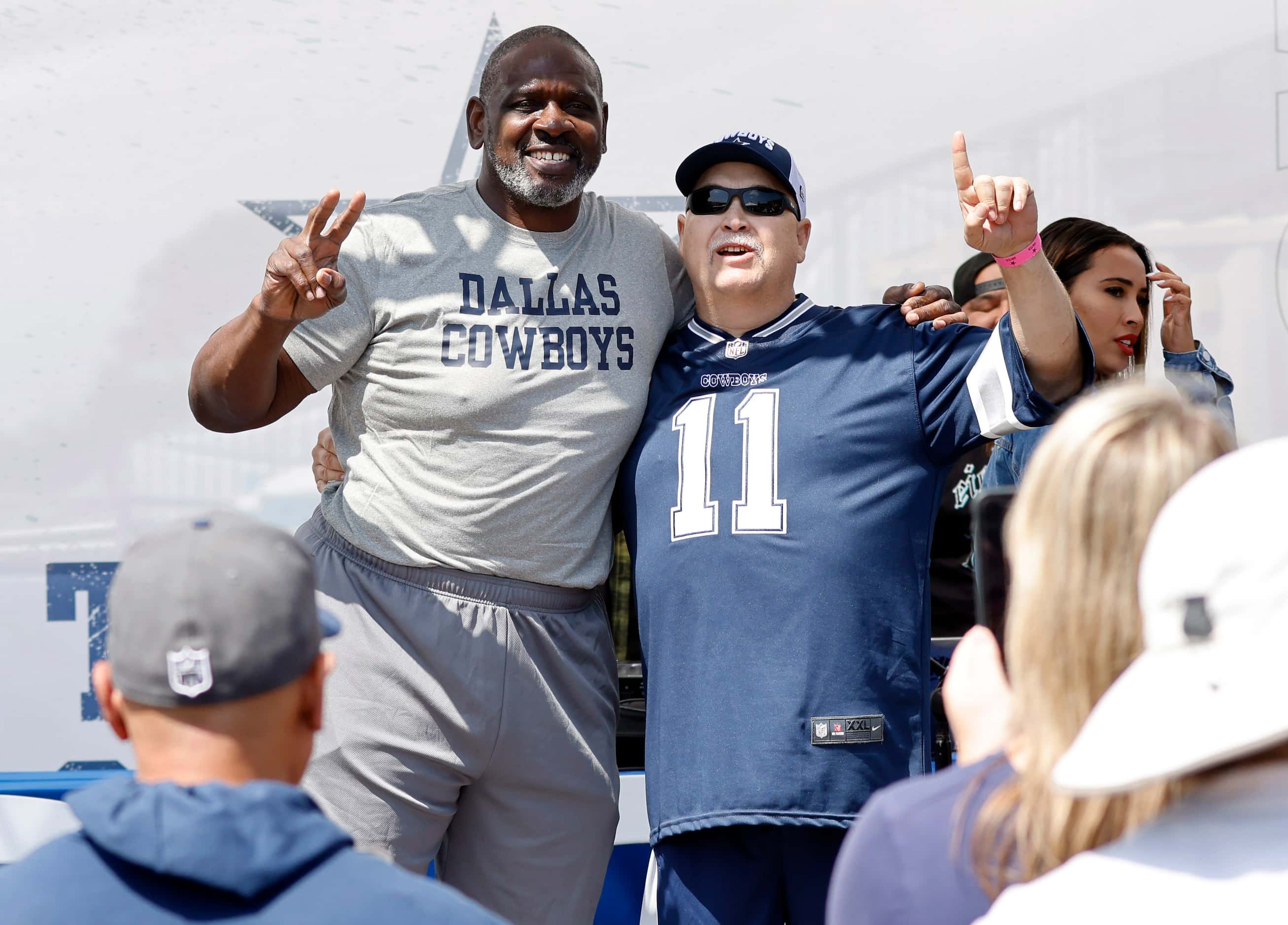 Dallas Cowboys fan Kevin Knott of Reedley, California (right) poses for a photo by his wife...