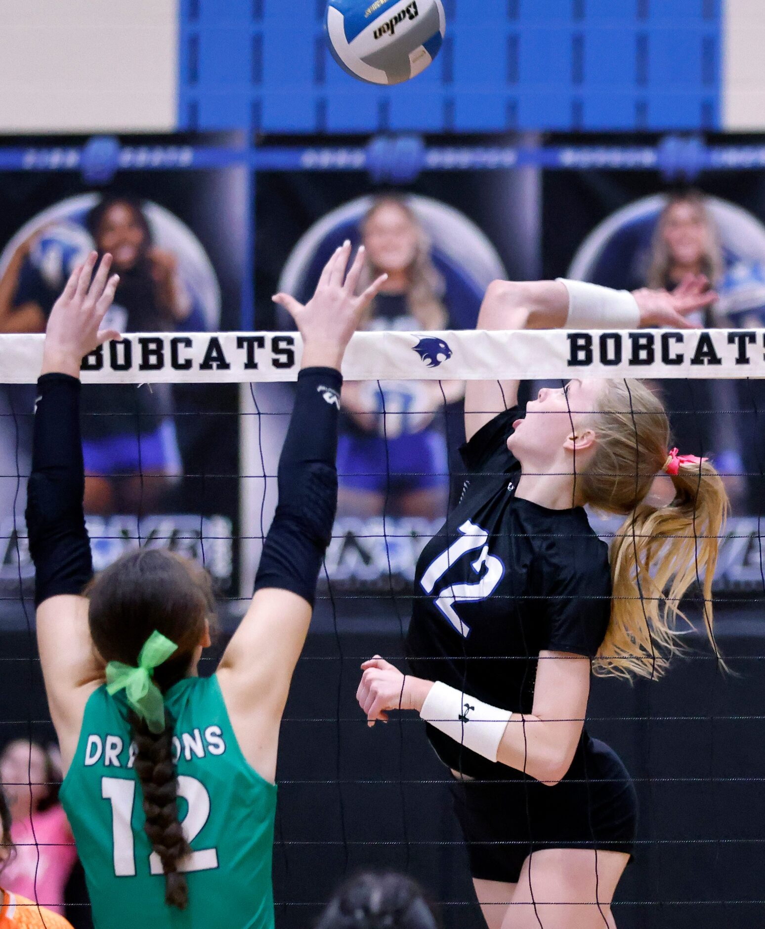 Trophy Club Byron Nelson outside hitter Ashlyn Seay (12) spikes the ball over Southlake...