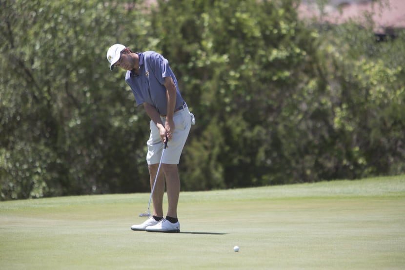 Highland Park's Scottie Scheffler makes a putt on the second hole during round two of the...