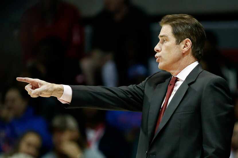 SMU head coach Tim Jankovich directs his team during the first half against Arkansas-Pine...