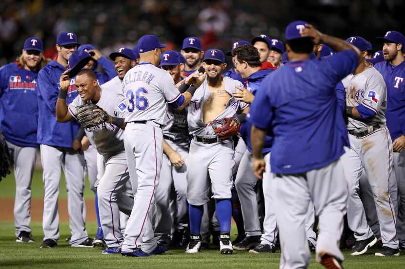 OAKLAND, CA - SEPTEMBER 23:  The Texas Rangers, including Adrian Beltre #29 and Rougned Odor...