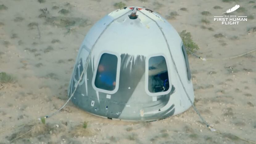 Blue Origin's craft capsule lands back in Van Horn after an 11-minute flight to an altitude...