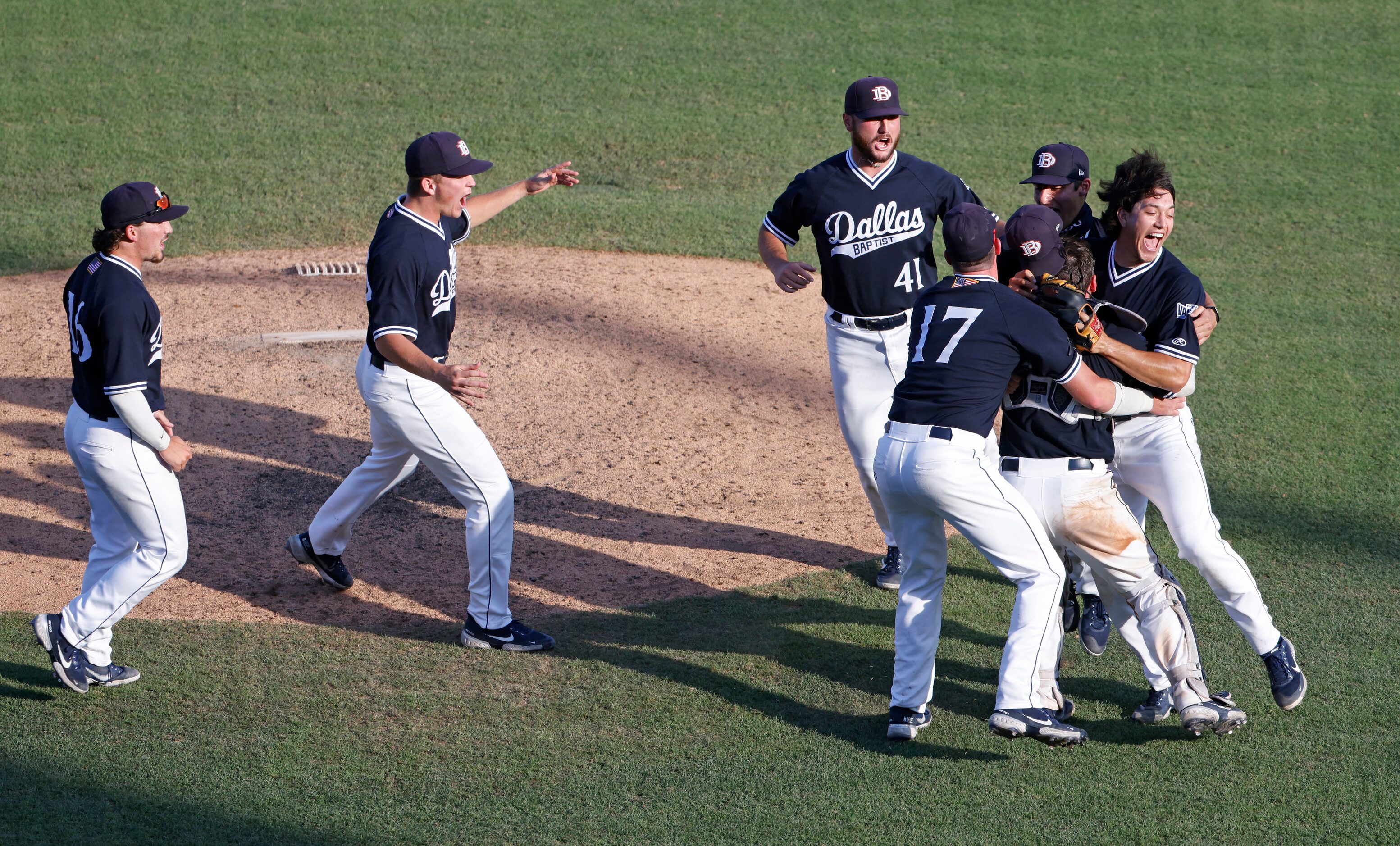 Dallas Baptist celebrates their 8-5 win over Oregon St. following the NCAA Division I...