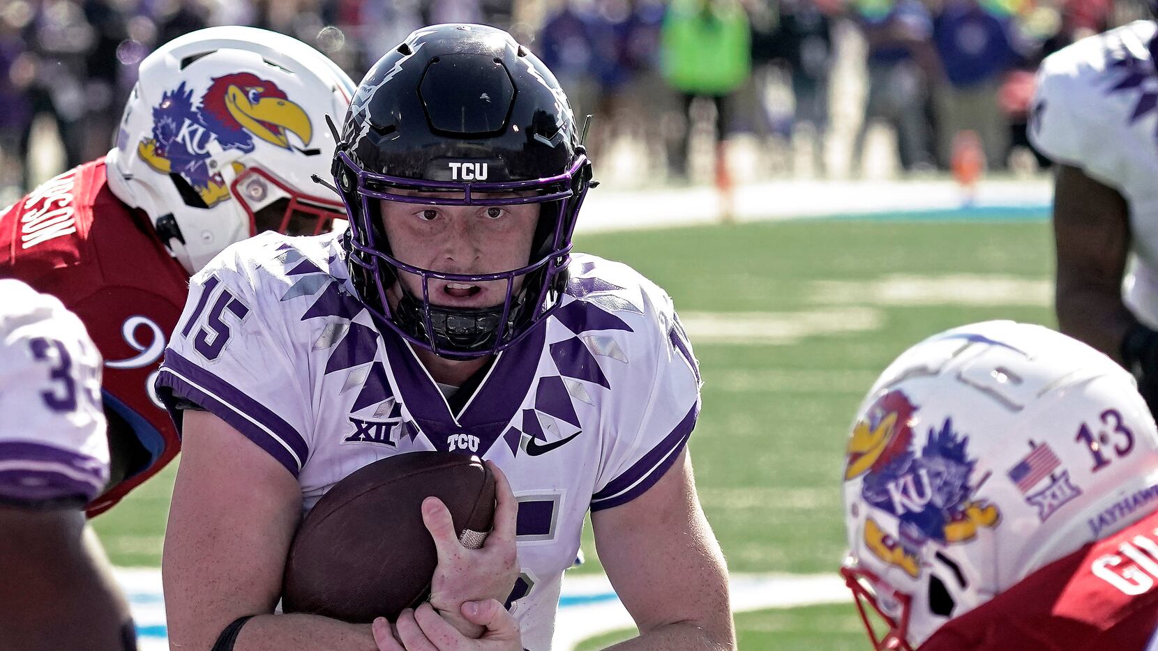 TCU quarterback Max Duggan runs for a touchdown during the second half of an NCAA college...