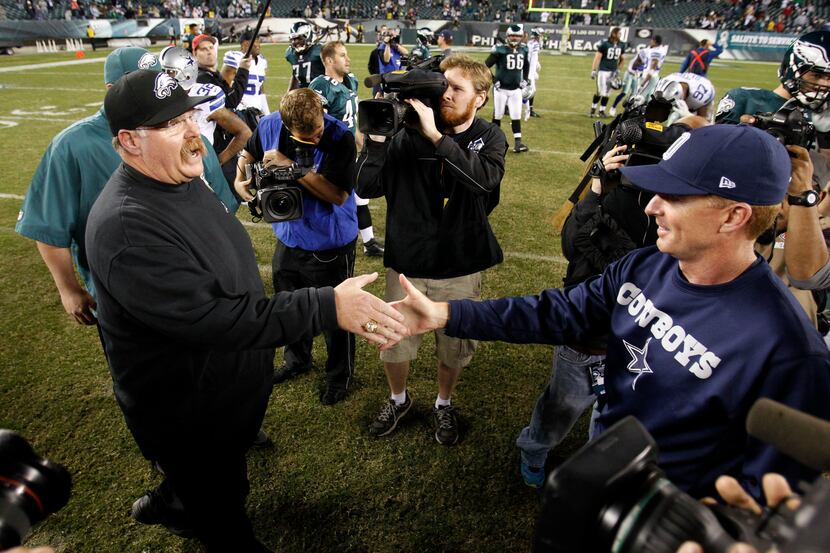 Philadelphia Eagles head coach Andy Reid and Dallas Cowboys head coach Jason Garrett shake...