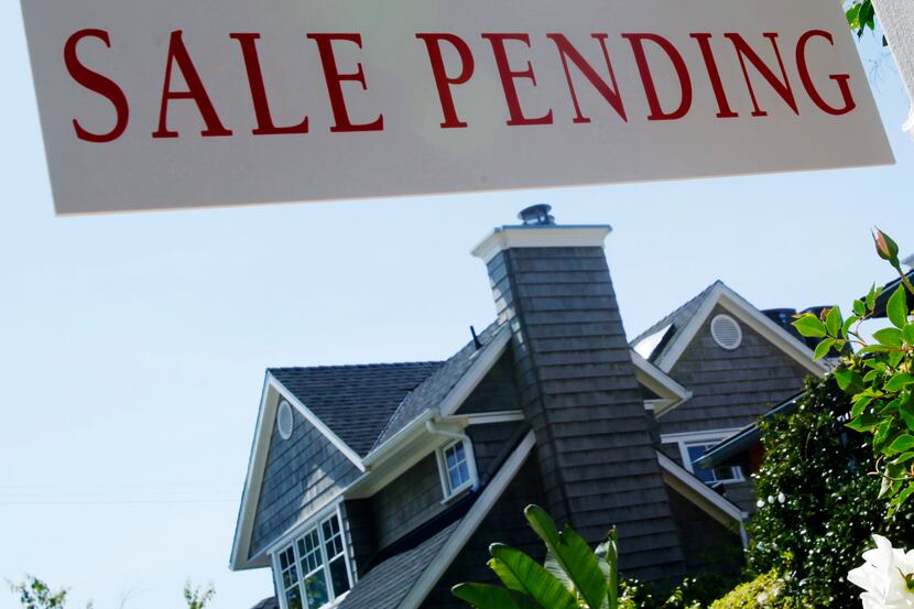 A 'sale pending' sign is seen in a Los Angeles neighborhood Thursday, April 14, 2011.  (AP...