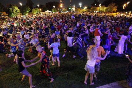 Polka music lovers dance a waltz during a performance by Denton polka band Brave Combo.