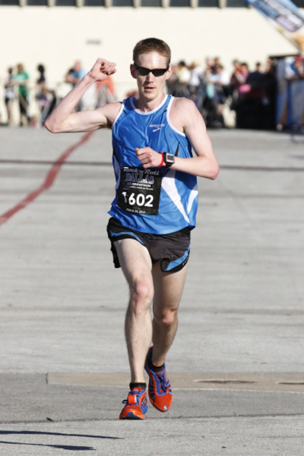 Aaron Hohn runs in the Dallas Rock 'N' Roll half marathon on Sunday, March 25, 2012.