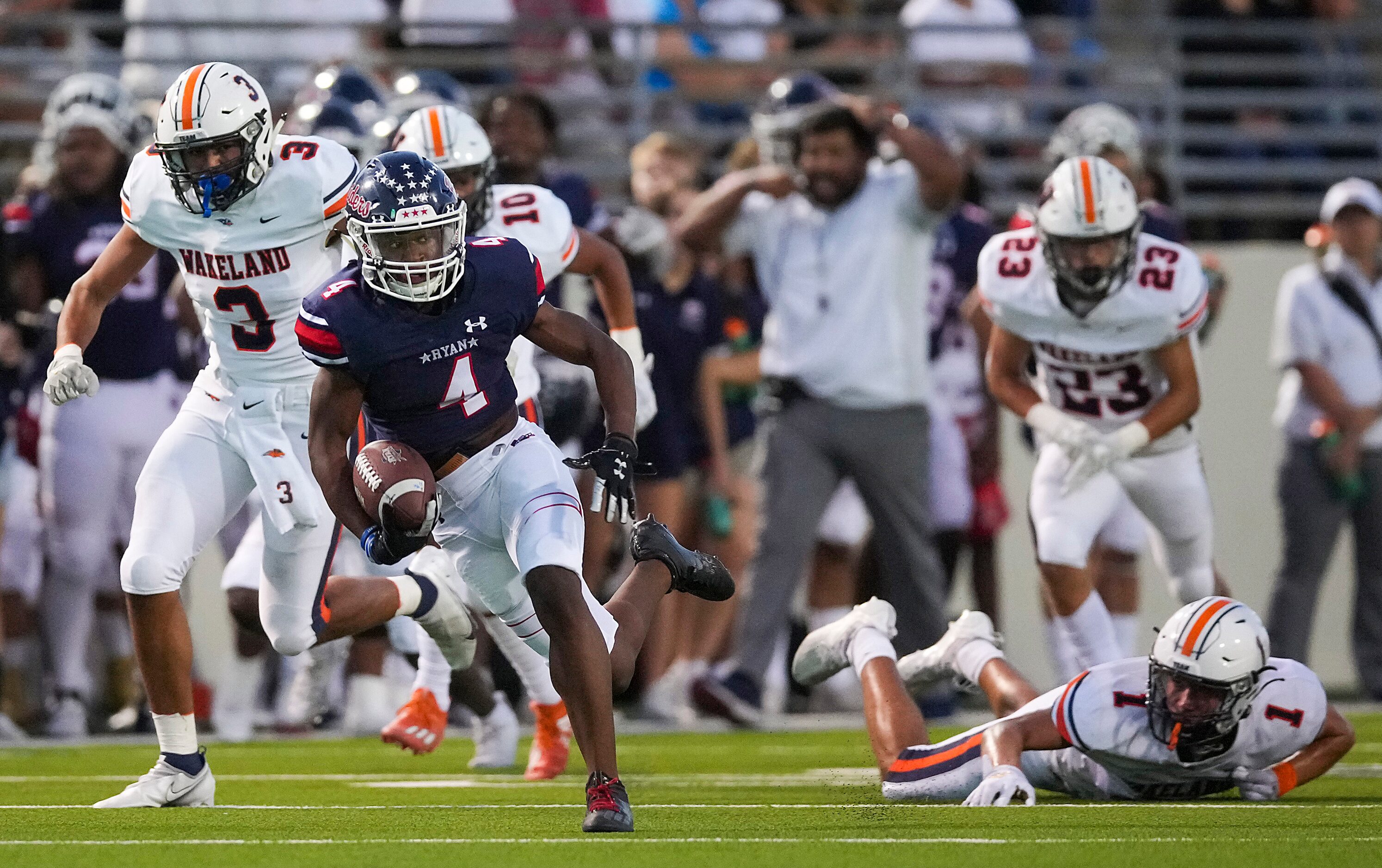 Denton Ryan wide receiver Jordyn Bailey (4) gets past Frisco Wakeland’s Davion Woolen (1)...