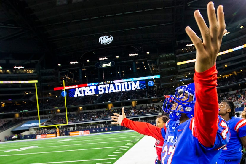 Duncanville defensive back Kyron Williams watches the final seconds tick off the clock of a...