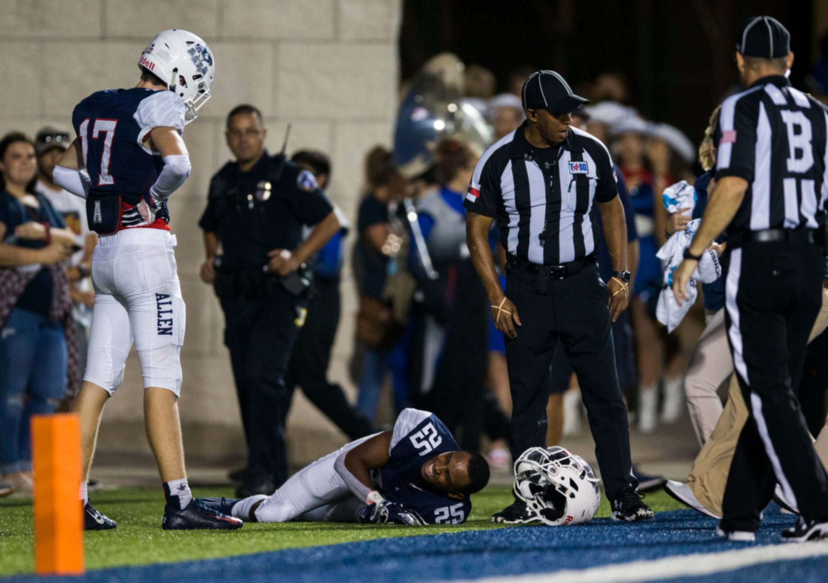 Allen defensive back Savion Richardson (25) is injured during the second quarter of a high...