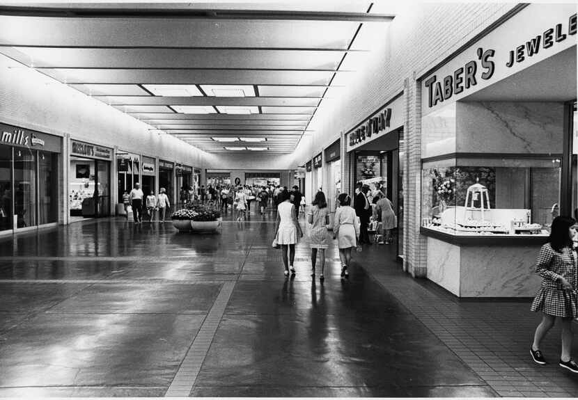 The store on the right that these young women were probably heading into was called Mode O'...