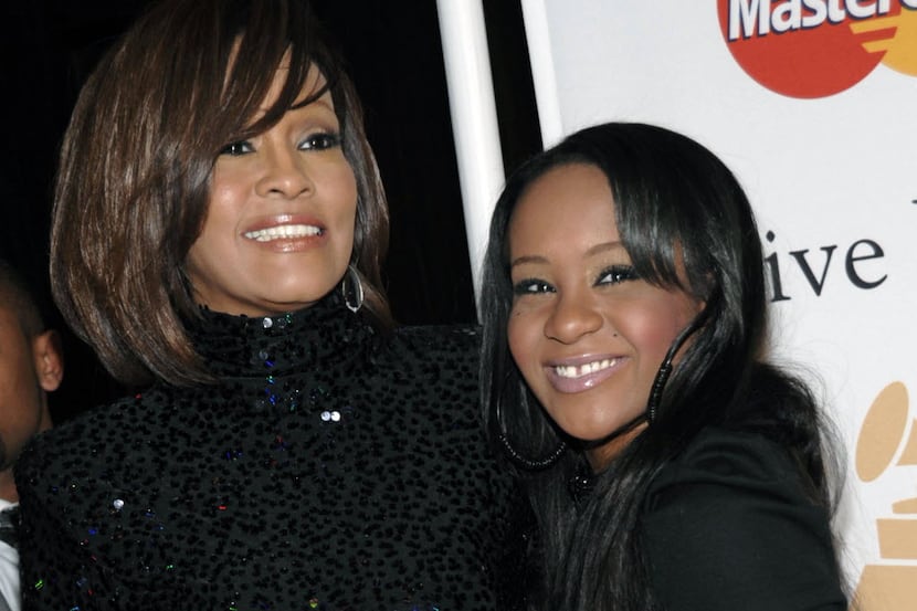  In this Feb. 12, 2011, file photo, singer Whitney Houston, left, and daughter Bobbi...