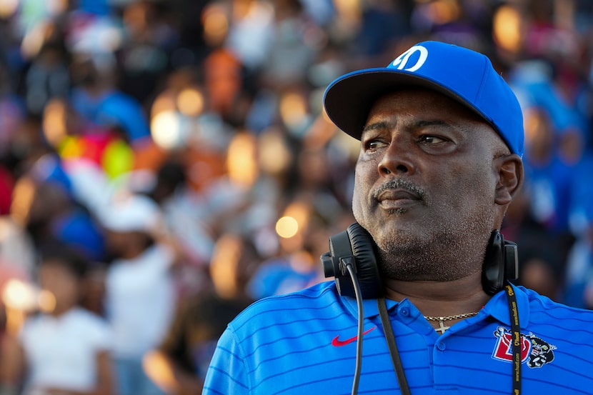 Duncanville head coach Reginald Samples watches his team take the field to face Mater Dei in...