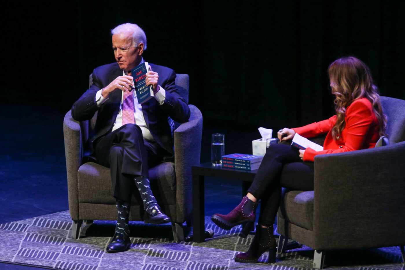 Former Vice President Joe Biden, left, speaks with author Rachel Hollis as part of his...