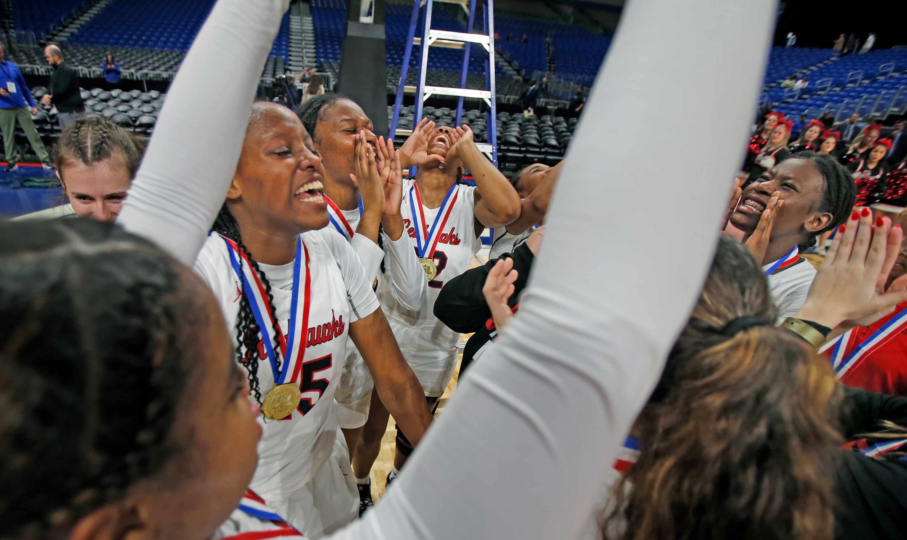 Frisco Liberty celebrates as they defeated Lubbock Lubbock Cooper 57-52 for girls basketball...