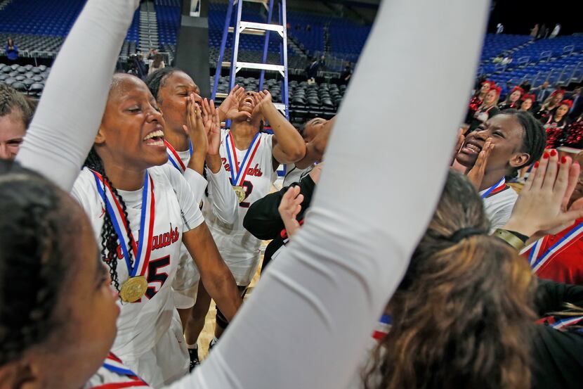 Frisco Liberty celebrates as they defeated Lubbock Lubbock Cooper 57-52 for girls basketball...