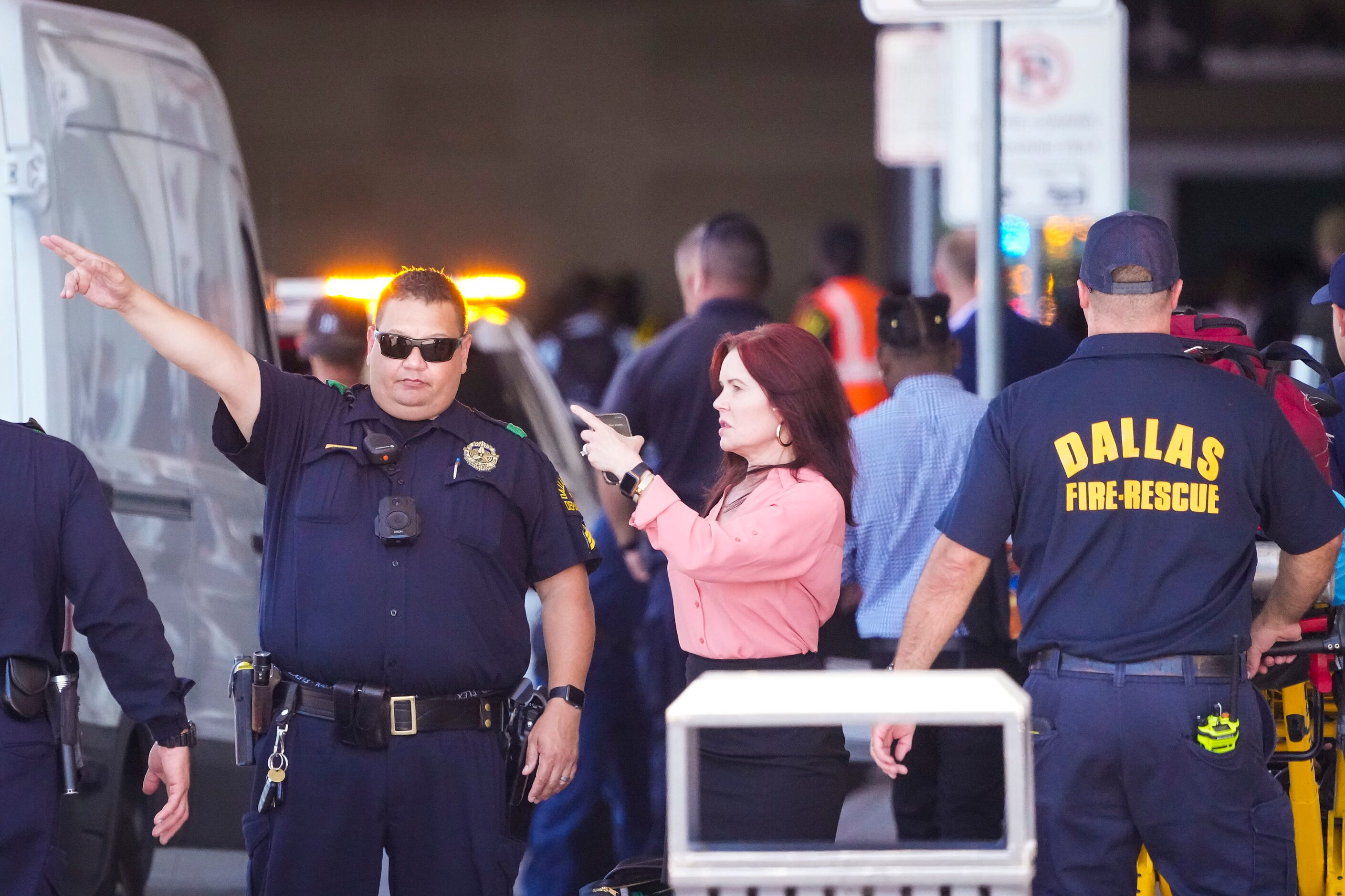 Passengers are directed away from the terminal at Dallas Love Field Airport on Monday, July...