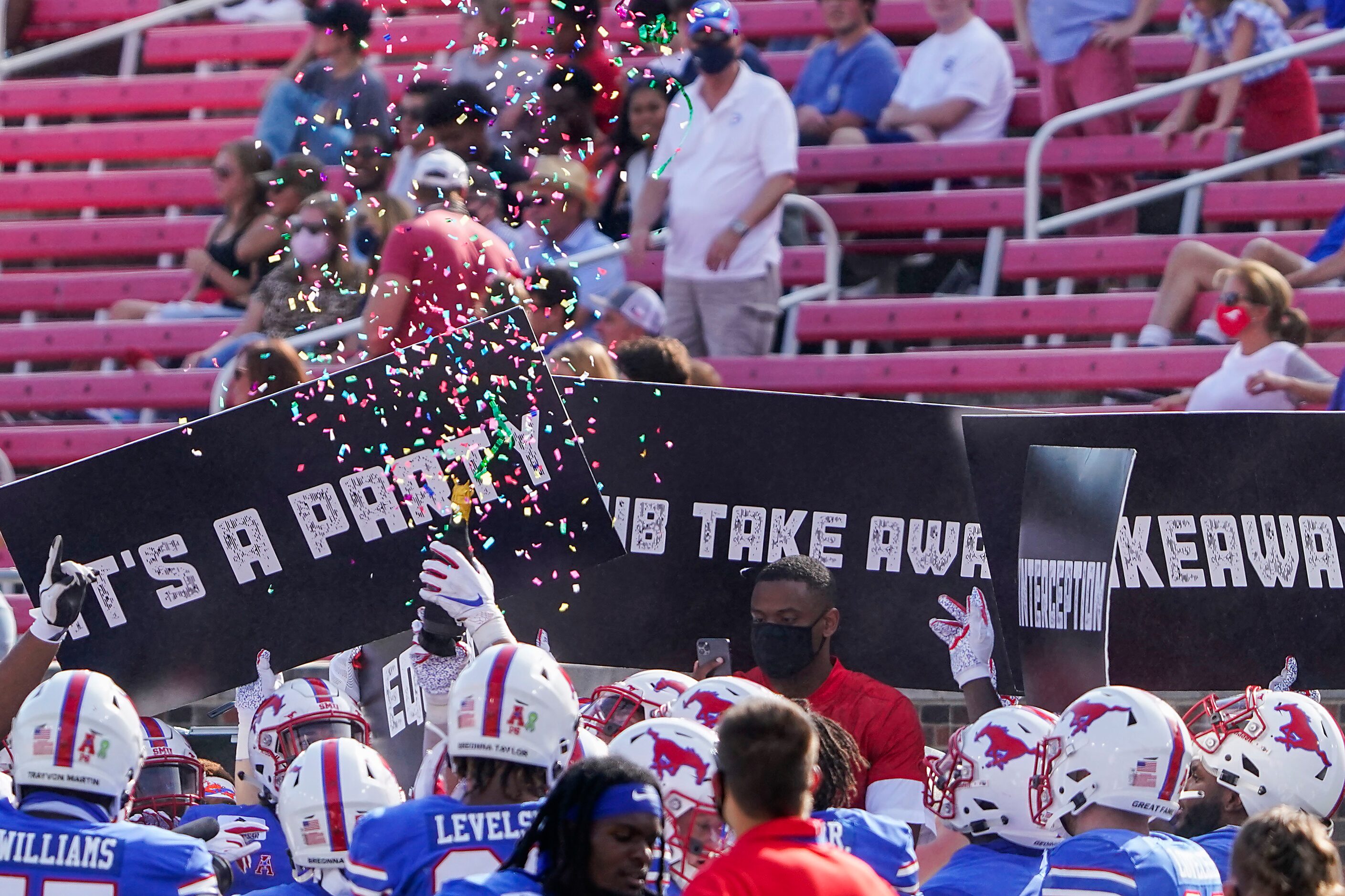 SMU players celebrate an interception during the first half of an NCAA football game against...