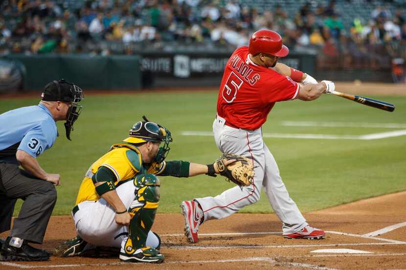 OAKLAND, CA - SEPTEMBER 06:  Albert Pujols #5 of the Los Angeles Angels of Anaheim hits a...
