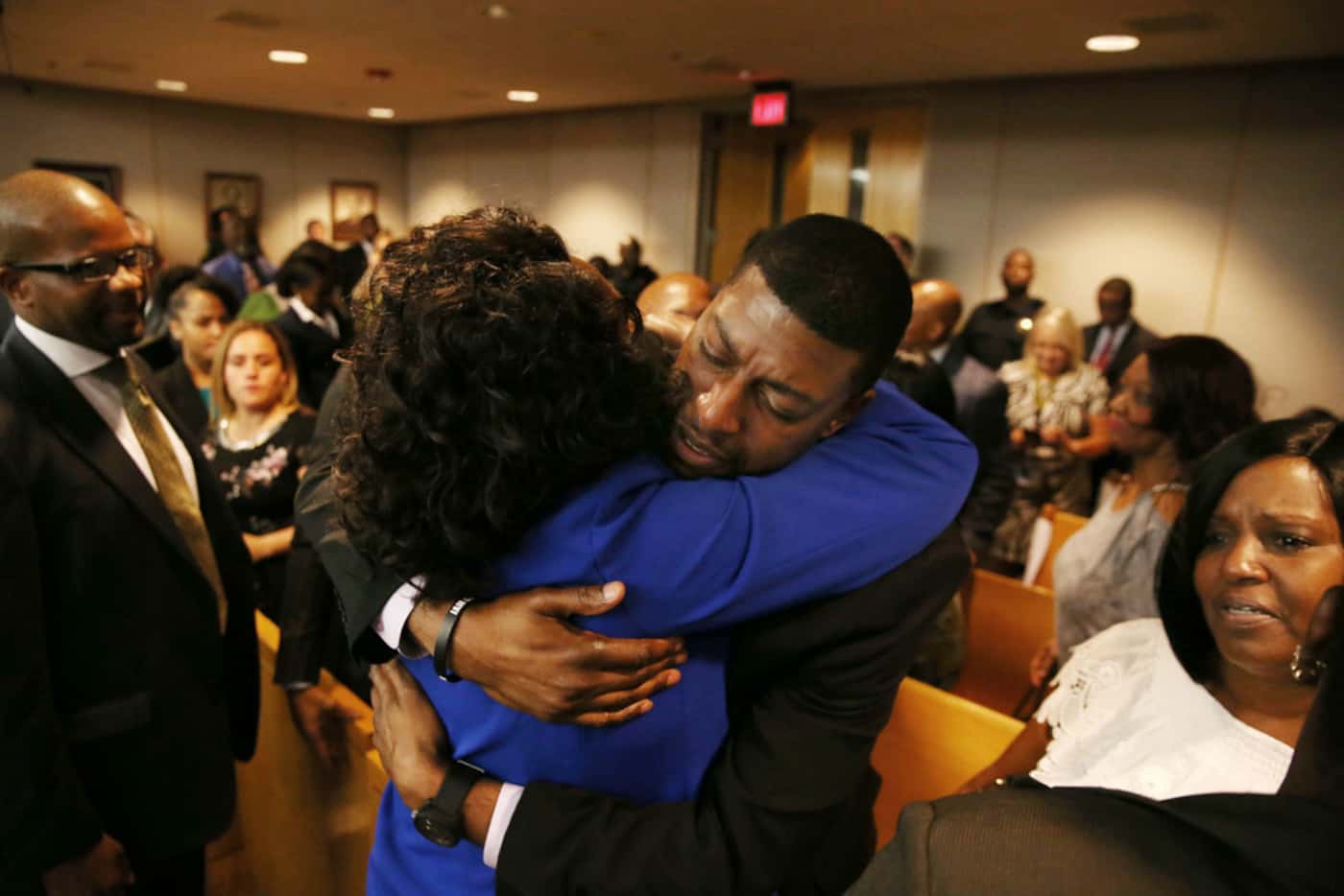 Odell Edwards hugs Dallas County District Attorney Faith Johnson after a guilty verdict in...