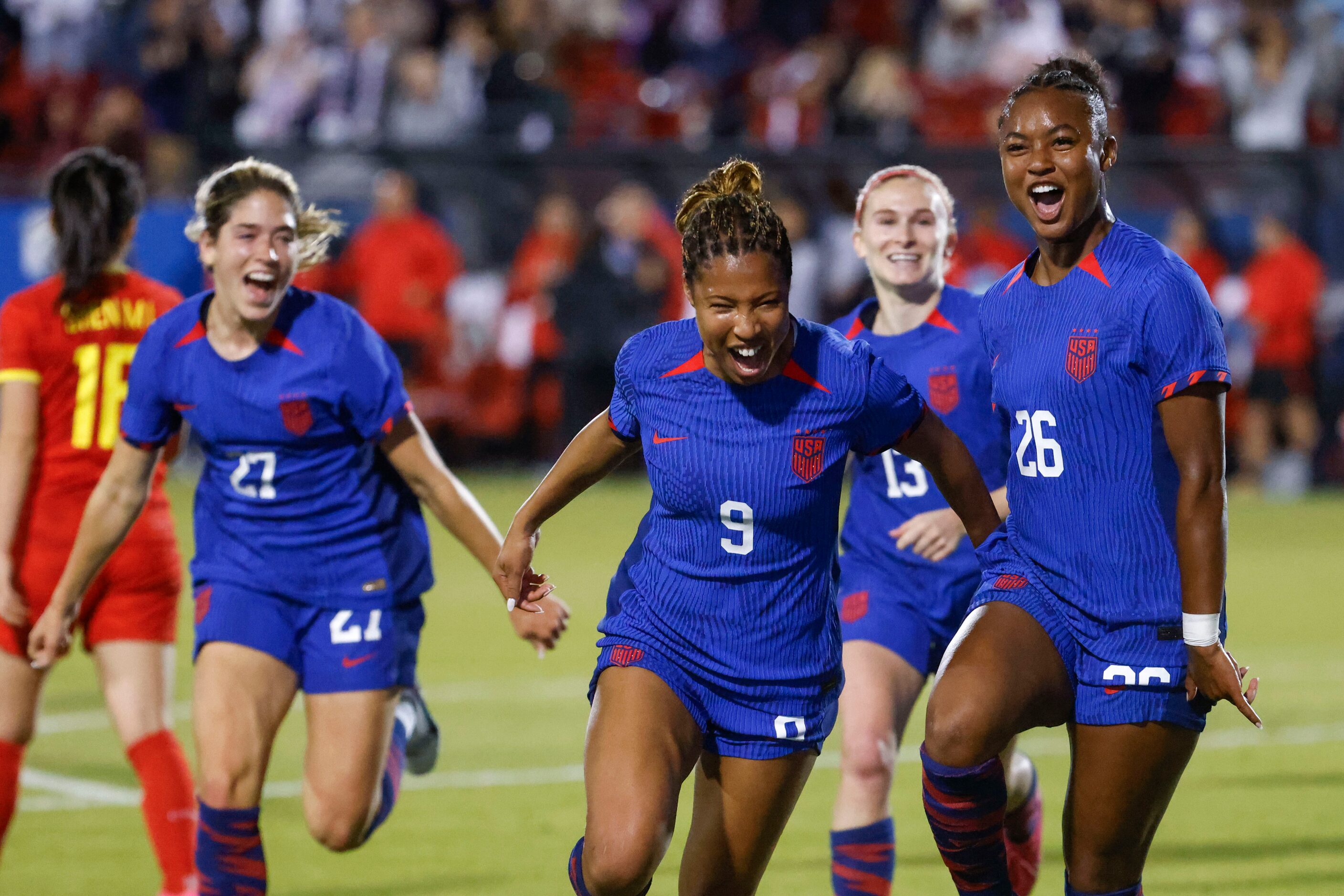 Untied State’s Jaedyn Shaw (26) celebrates her first international goal during the second...