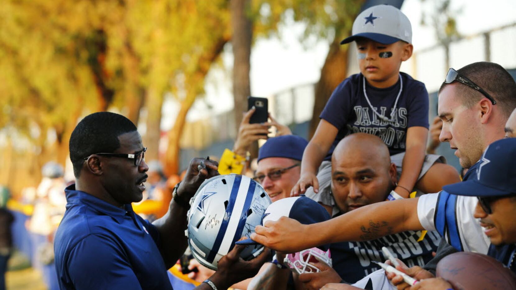 What did Michael Irvin do with his first paycheck from the Cowboys? Use it  as the ultimate pickup line