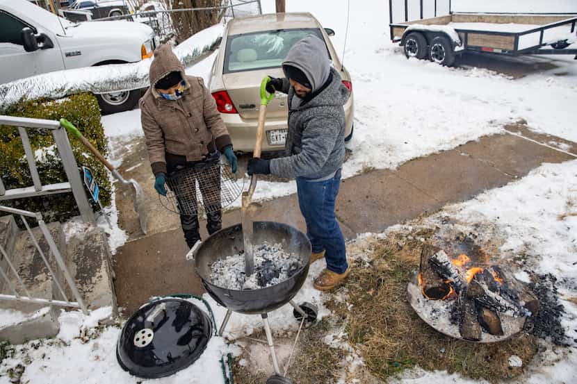 In this Feb. 17 file photo, an East Dallas couple who'd lost power three days earlier and...