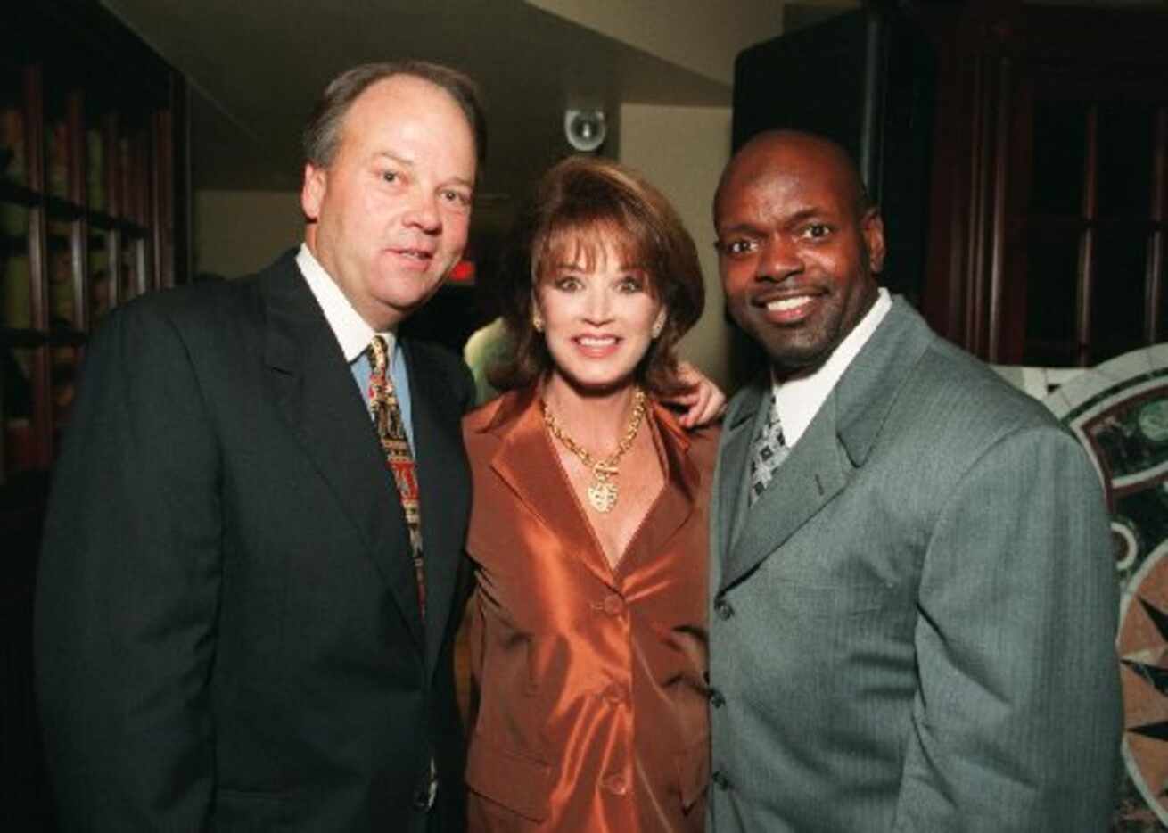 Barry Andrews and his wife, Lana Andrews, with Emmitt Smith at Palm Night '98, benefiting...