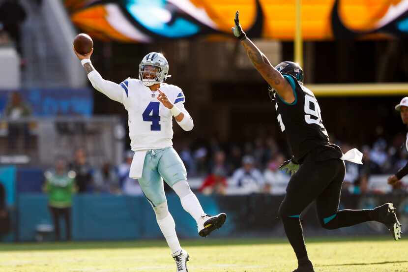 Dallas Cowboys quarterback Dak Prescott (4) passes the ball during the second half of the...