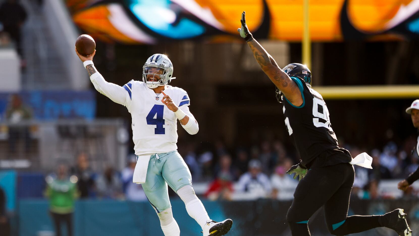 Dallas Cowboys quarterback Dak Prescott (4) passes the ball during the second half of the...