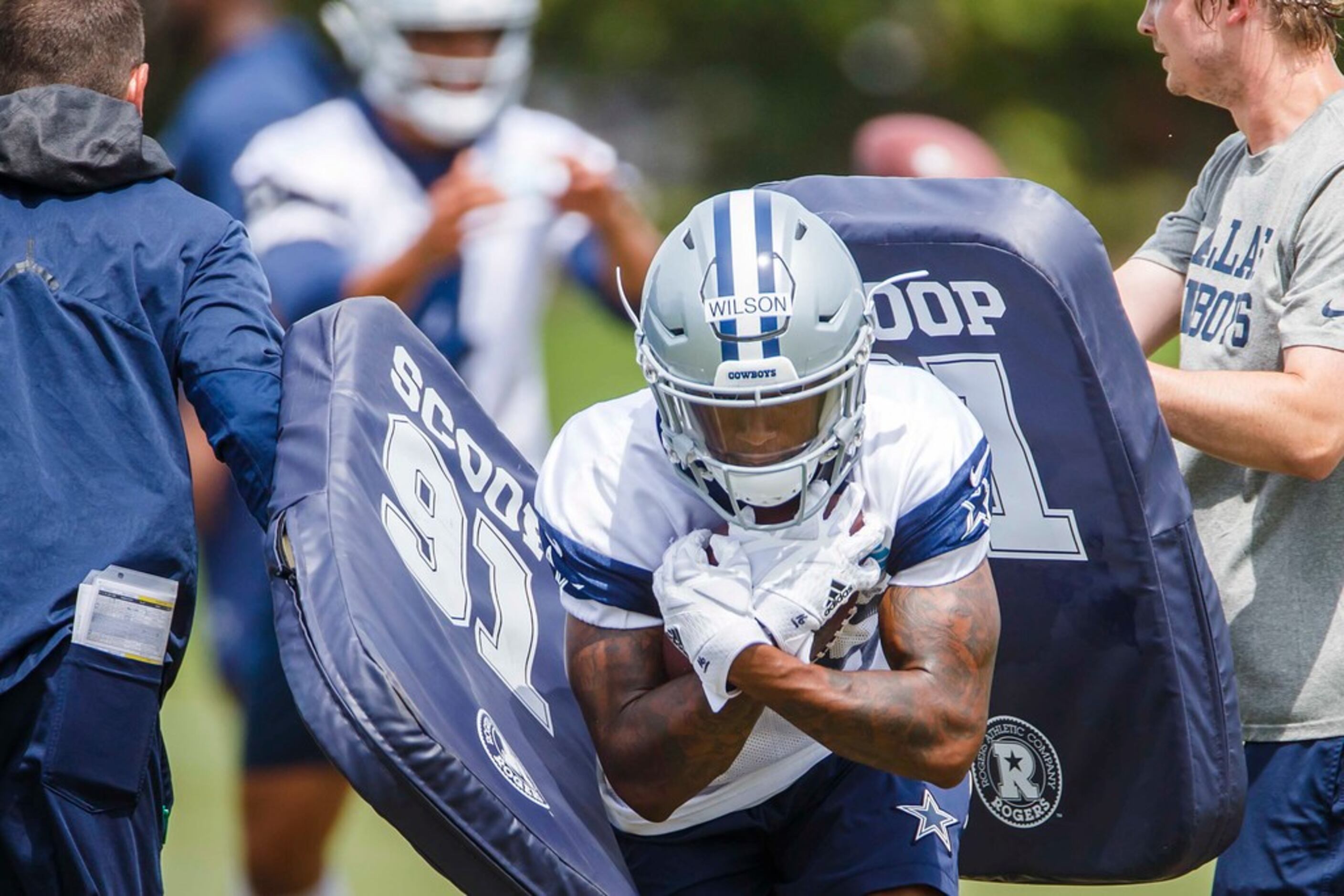 Cowboys WR Cedrick Wilson nursing ankle injury, misses second