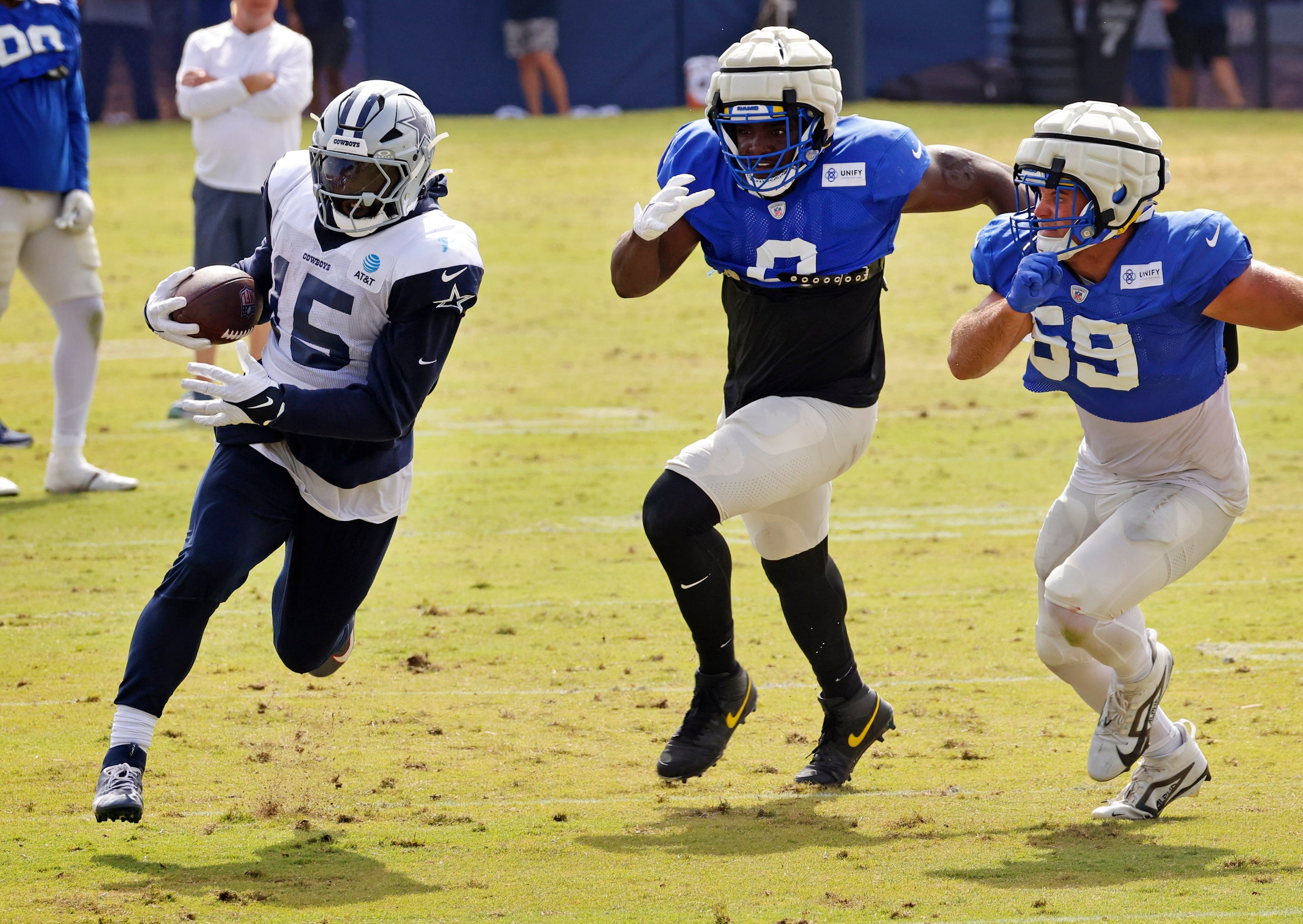 Dallas Cowboys running back Ezekiel Elliott (15) breaks away from the Los Angeles Rams...