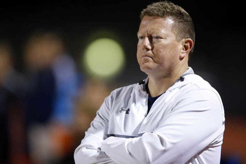 Frisco Wakeland head coach Rusty Oglesby watches his team face Wylie East during their 5A...