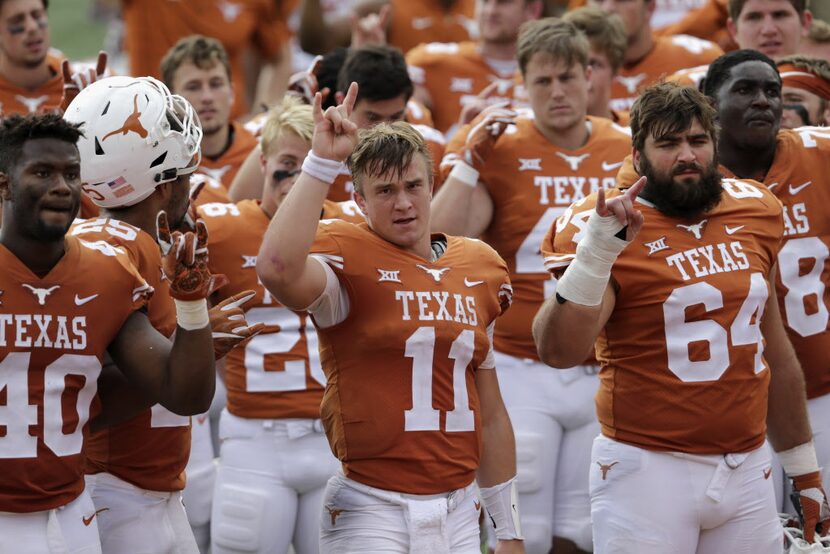 AUSTIN, TX - OCTOBER 21:  Sam Ehlinger #11 of the Texas Longhorns sings The Eyes of Texas...