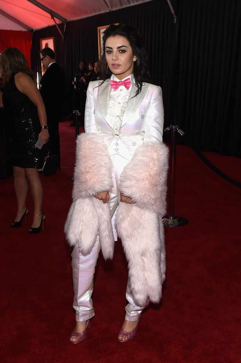MISS: Charli XCX appeared to have gone digging through a 1980s costume closet for this...