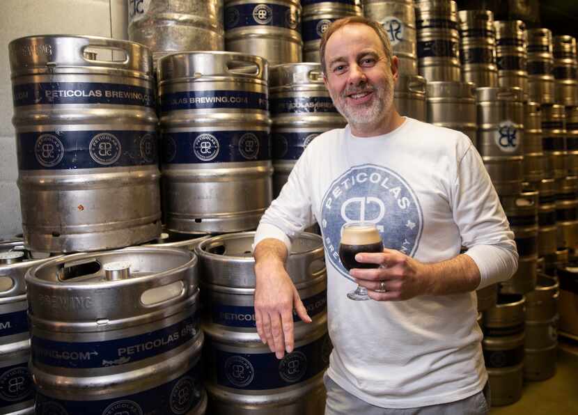 Owner Michael Peticolas poses for a photo at Peticolas Brewing Co. on Jan. 10, 2020 in...