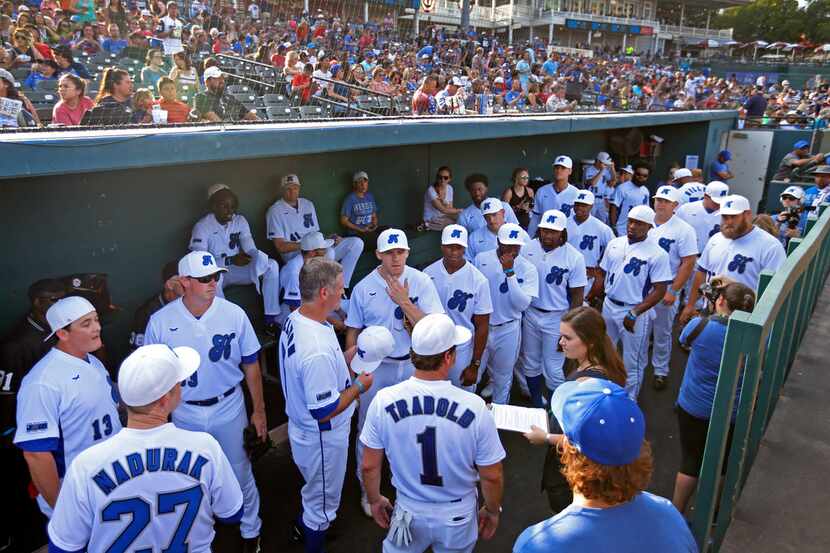 Blue Sox players and coaches gather in the dugout during the Dirk Nowitzki Heroes Celebrity...